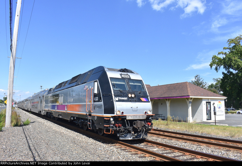 NJT Train # 4741, being led by ALP-45DP # 4533, passes through the north end of Asbury Park